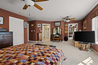 Set on 3.55 waterfront acres, this one-level custom home offers