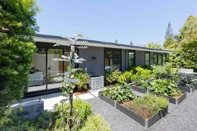 Completely renovated, this exceptional home blends iconic design - photo 22