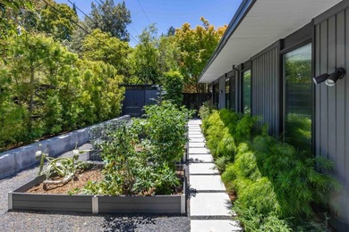 Completely renovated, this exceptional home blends iconic design - photo 23