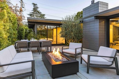 Completely renovated, this exceptional home blends iconic design - photo 24