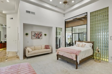 Nestled against a dramatic mountain backdrop and framed by