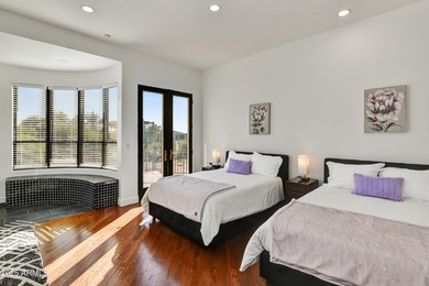 Nestled against a dramatic mountain backdrop and framed by