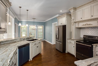 Welcome home to this beautiful custom built brick estate - photo 8