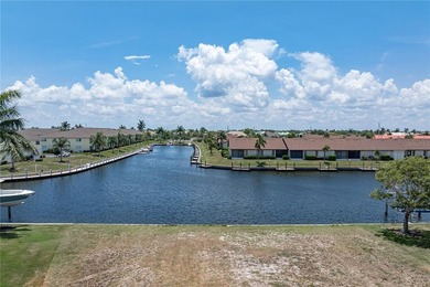 SAIL ACCESS, WATERFRONT LOT IN PGI W/110FT OF SEAWALL & SUNSET - photo 4