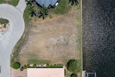 SAIL ACCESS, WATERFRONT LOT IN PGI W/110FT OF SEAWALL & SUNSET - photo 5