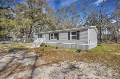 Lake Home For Sale in Ellabell, Georgia