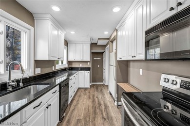 Welcome to 180 E. 264th Street, a beautifully updated 3-bedroom - photo 9