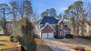 Beautiful brick front 4 bedroom, 4 full bathroom home featuring