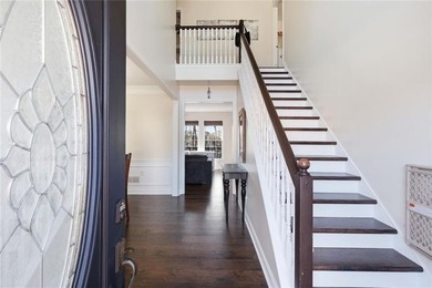 Beautiful brick front 4 bedroom, 4 full bathroom home featuring