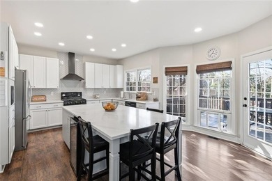 Beautiful brick front 4 bedroom, 4 full bathroom home featuring