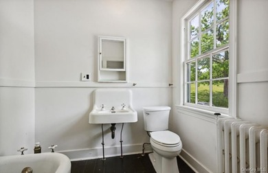 Welcome to 38 Landing Meadow Road, Smithtown. Nestled on almost - photo 11