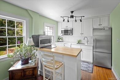 Welcome to 38 Landing Meadow Road, Smithtown. Nestled on almost - photo 24