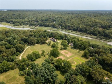 Welcome to 38 Landing Meadow Road, Smithtown. Nestled on almost - photo 31