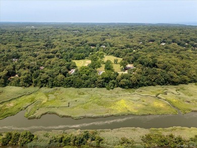 Welcome to 38 Landing Meadow Road, Smithtown. Nestled on almost - photo 32