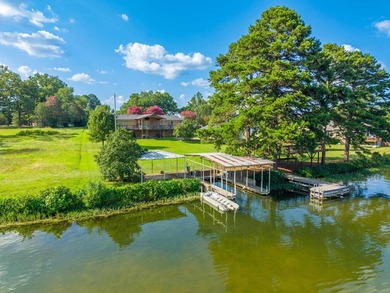 Experience the best of lake living with this beautifully updated - photo 1