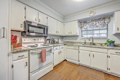 Light, bright, and inviting throughout, this thoughtfully - photo 5