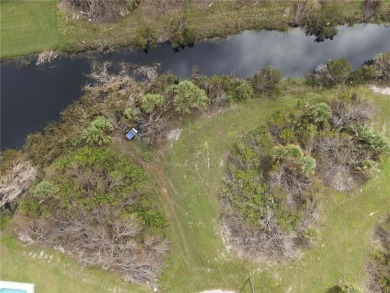 Don't miss out on this OVERSIZED, CANAL-FRONT Rotonda Lakes lot - photo 2