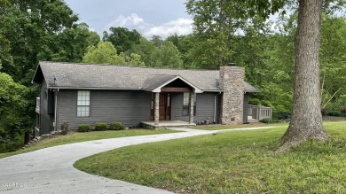 This waterfront handcrafted home is truly one of a kind! This - Lake Home For Sale in Harriman, Tennessee