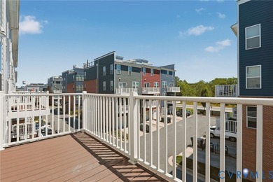 This beautifully designed two-story townhome style condo with a - photo 11