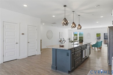 This beautifully designed two-story townhome style condo with a - photo 14