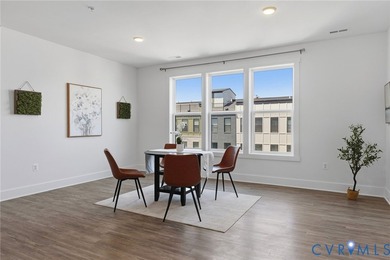 This beautifully designed two-story townhome style condo with a - photo 15