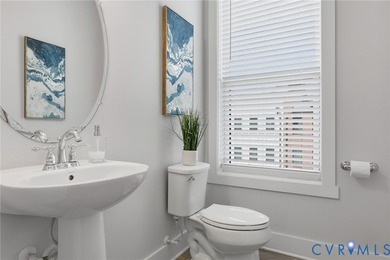 This beautifully designed two-story townhome style condo with a - photo 16