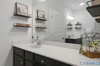 This beautifully designed two-story townhome style condo with a - photo 21