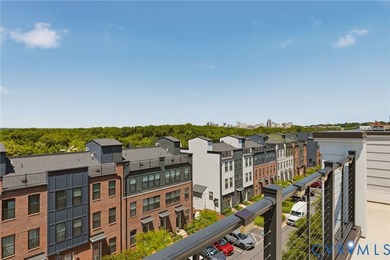 This beautifully designed two-story townhome style condo with a - photo 30