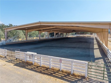 Welcome to 8900 Wight Way, a rare equestrian retreat designed - photo 3