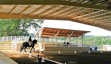 Welcome to 8900 Wight Way, a rare equestrian retreat designed - photo 6