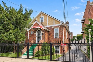Welcome to this well-configured two-family home in the heart of - photo 1