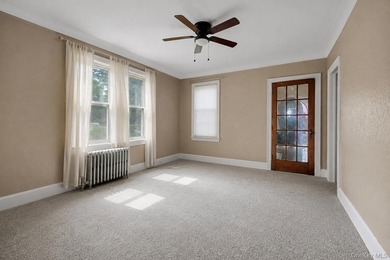 Welcome to this well-configured two-family home in the heart of - photo 2