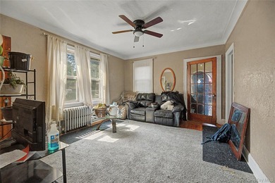 Welcome to this well-configured two-family home in the heart of - photo 3
