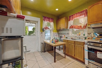 Welcome to this well-configured two-family home in the heart of - photo 5