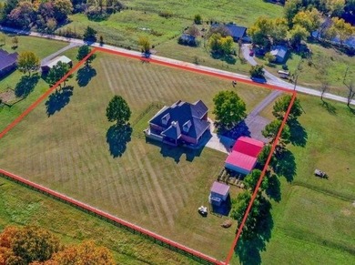 Tucked away on 2.5 serene acres just outside Fayetteville, this