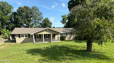 Welcome home to this well-maintained three-bedroom, two-bath - photo 2