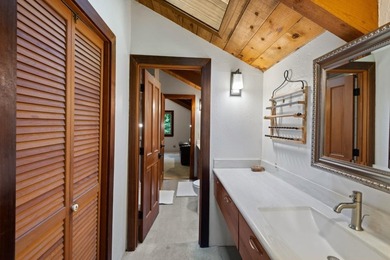 A private road and paved, circular driveway lead to this custom - photo 12