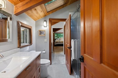 A private road and paved, circular driveway lead to this custom - photo 13