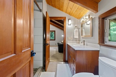 A private road and paved, circular driveway lead to this custom - photo 15