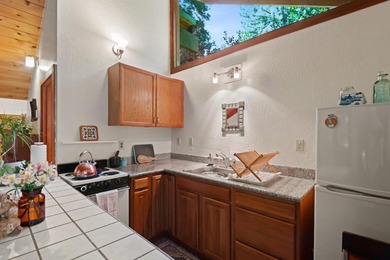 A private road and paved, circular driveway lead to this custom - photo 26