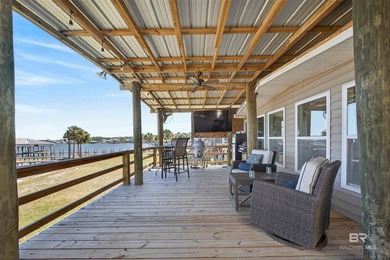 Experience the best of coastal living with this prime waterfront - photo 11