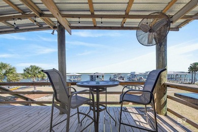Experience the best of coastal living with this prime waterfront - photo 12