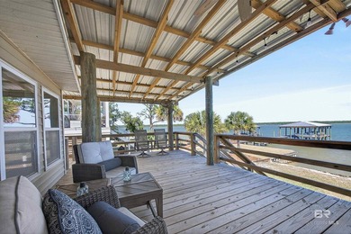 Experience the best of coastal living with this prime waterfront - photo 13