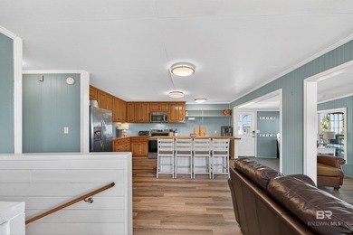 Experience the best of coastal living with this prime waterfront - photo 30