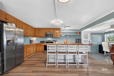 Experience the best of coastal living with this prime waterfront - photo 32