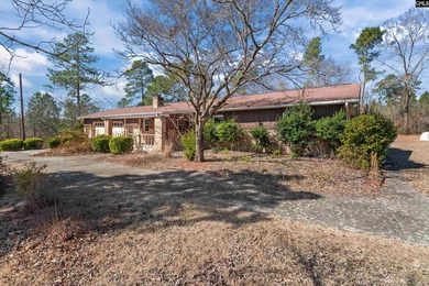 Enjoy peaceful country living on 2.07 private acres at 336 Muddy