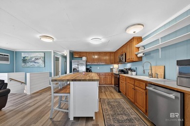 Experience the best of coastal living with this prime waterfront - photo 36
