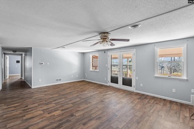 Enjoy peaceful country living on 2.07 private acres at 336 Muddy