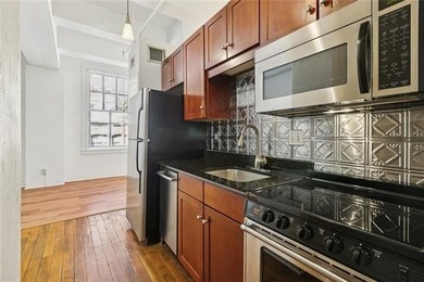 Welcome to this light-filled 1-bedroom, 1-bath condo located in