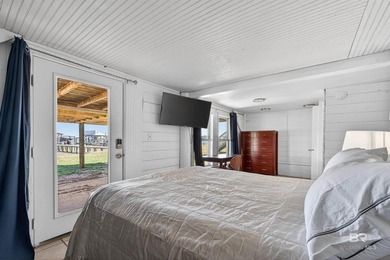 Experience the best of coastal living with this prime waterfront - photo 49